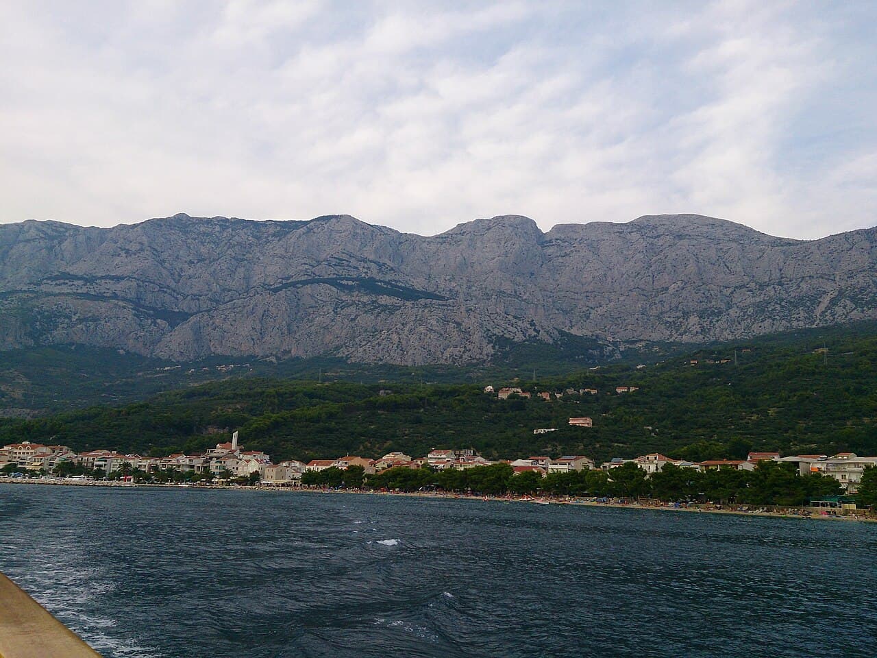 Tučepi seafront below the Biokovo mountains, seen from the sea